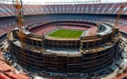 Immagine del Camp Nou con skyline di Barcellona